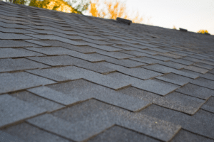 Close-up of asphalt roofing shingles on a residential roof