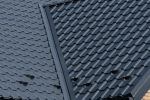 Roof valley with shingles and metal flashing showing roof flashing installation requirements.